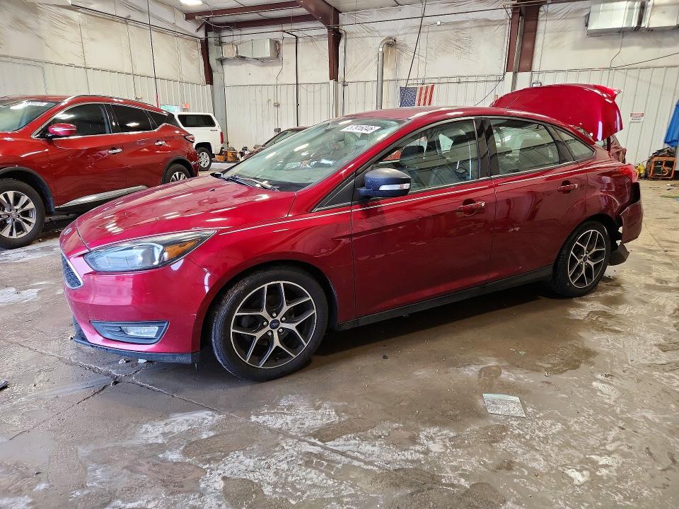 FORD FOCUS 2017 with VIN 1FADP3H29HL221052 - Photo from auction