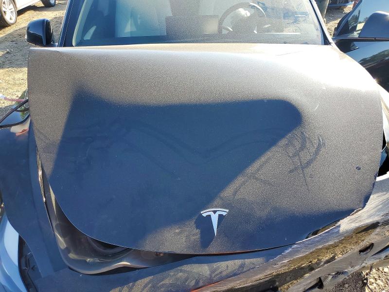 Photo 11 from auction – 2023 TESLA MODEL Y with VIN 7SAYGDEE4PF628068