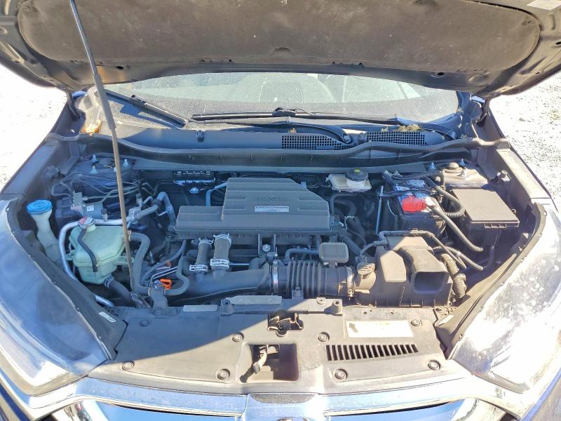 Photo 12 from auction – 2018 HONDA CR-V with VIN 7FARW2H96JE095613