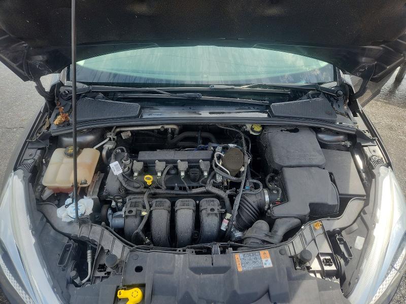 Photo 11 from auction – 2015 FORD FOCUS with VIN 1FADP3F20FL318334