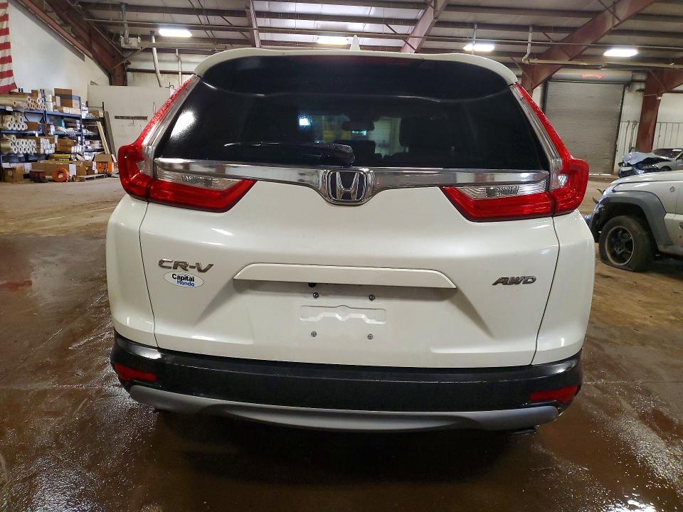 Photo 6 from auction – 2017 HONDA CR-V with VIN 2HKRW2H87HH684409