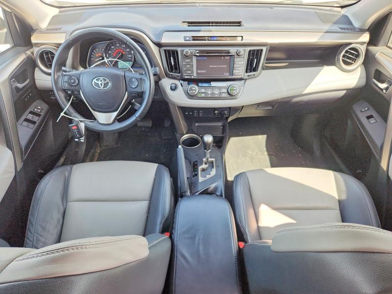 Photo 8 from auction – 2014 TOYOTA RAV4 with VIN 2T3DFREV8EW169646