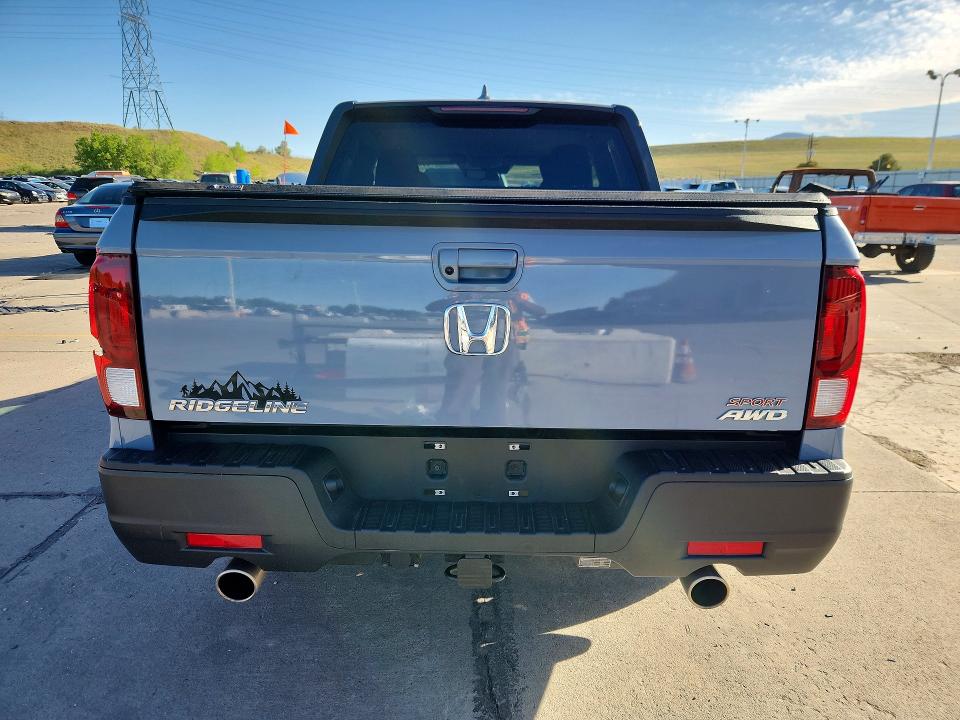 Photo 6 from auction – 2023 HONDA RIDGELINE with VIN 5FPYK3F18PB067947