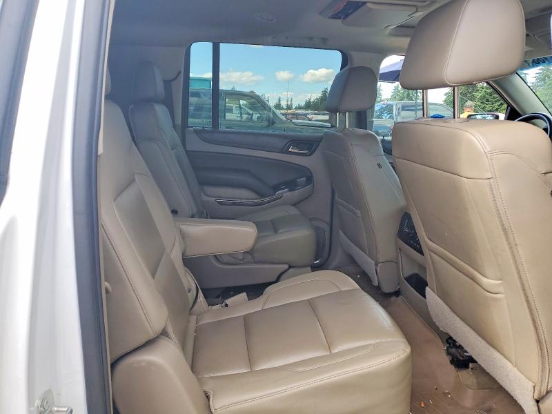Photo 10 from auction – 2017 CHEVROLET SUBURBAN with VIN 1GNSKHKCXHR141018