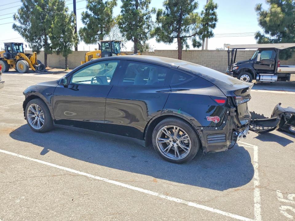 Photo 2 from auction – 2023 TESLA MODEL Y with VIN 7SAYGDED3PF980193