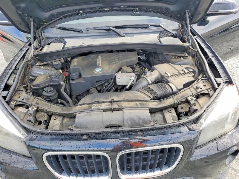 Photo 12 from auction – 2014 BMW X1 with VIN WBAVL1C51EVY10755