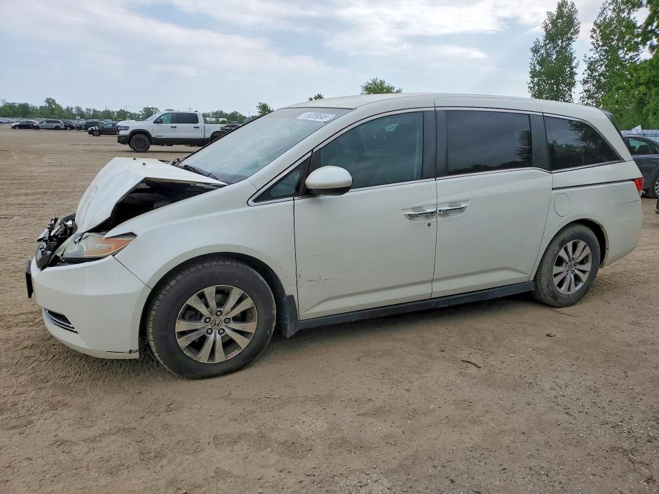 HONDA ODYSSEY 2016 with VIN 5FNRL5H45GB500122 - Photo from auction