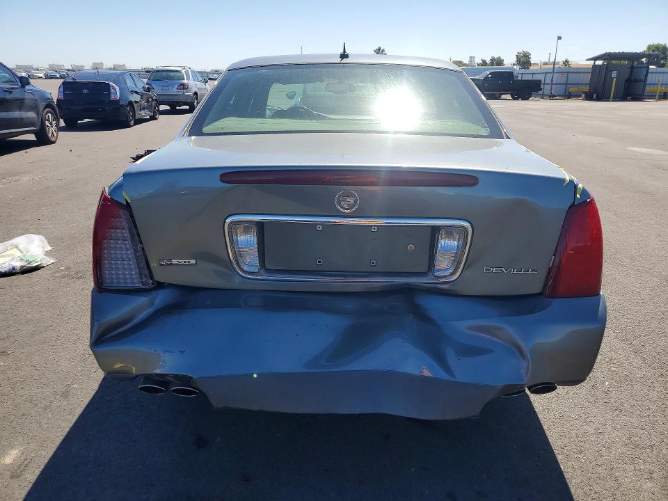 Photo 6 from auction – 2005 CADILLAC DEVILLE with VIN 1G6KD54YX5U261424