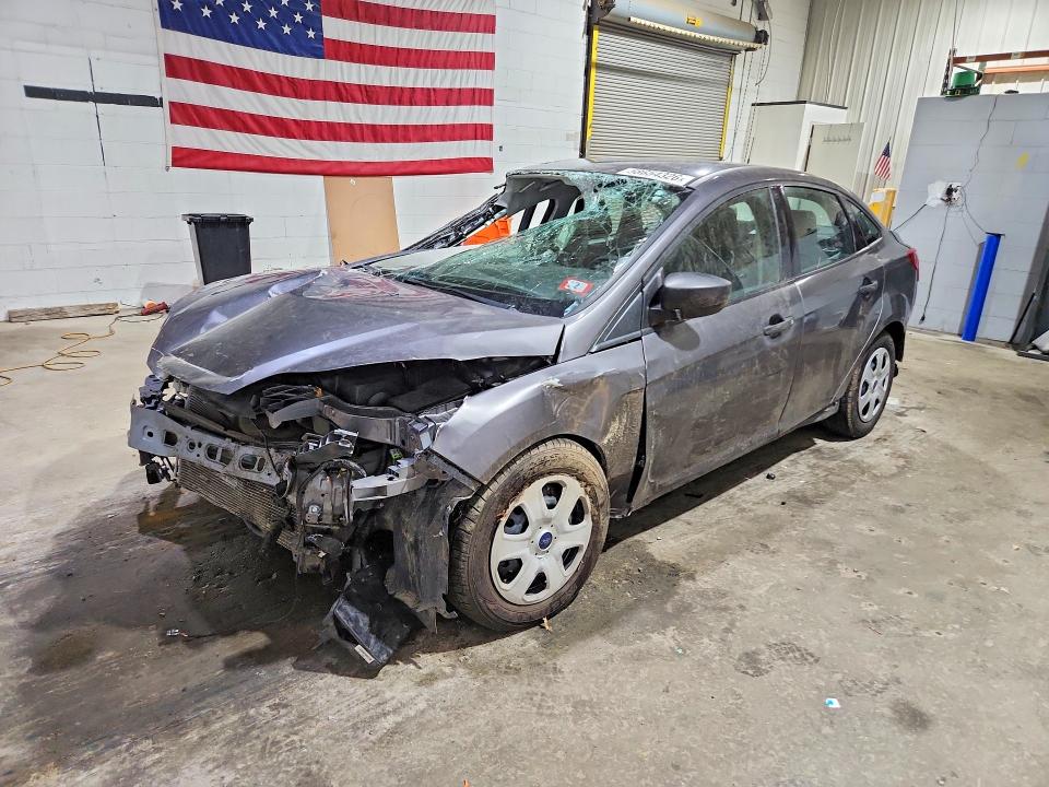 FORD FOCUS 2014 with VIN 1FADP3E28EL386235 - Photo from auction