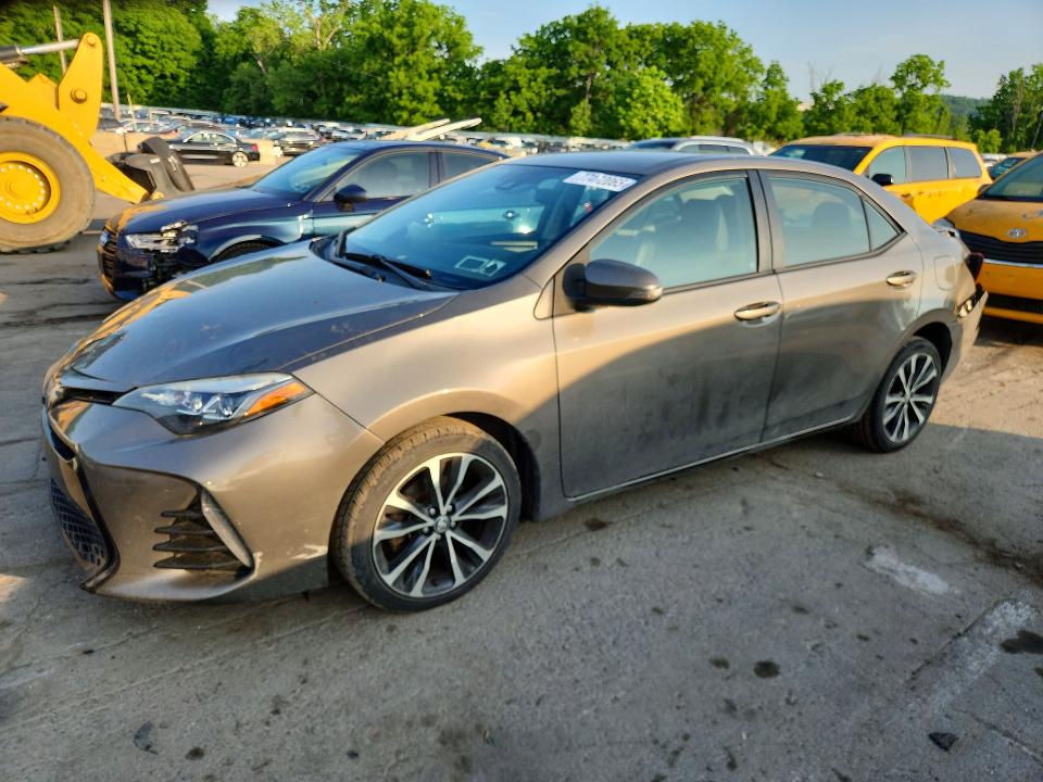 TOYOTA COROLLA 2017 with VIN 2T1BURHE6HC778421 - Photo from auction