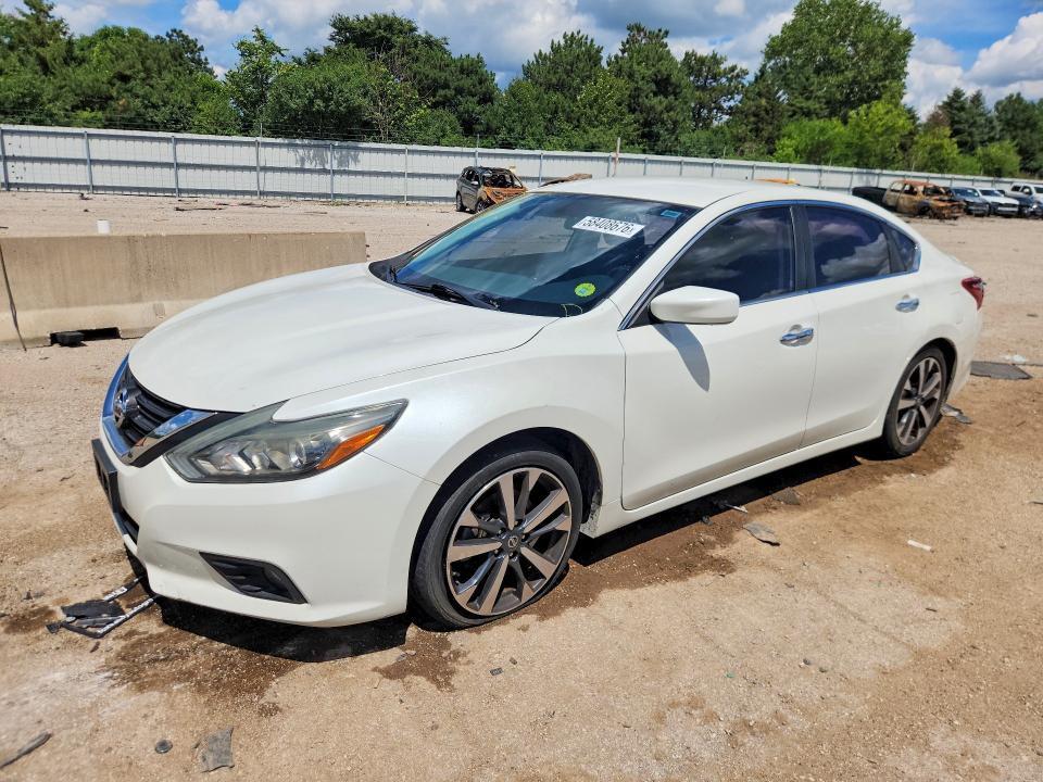 NISSAN ALTIMA 2017 with VIN 1N4AL3AP0HC156614 - Photo from auction