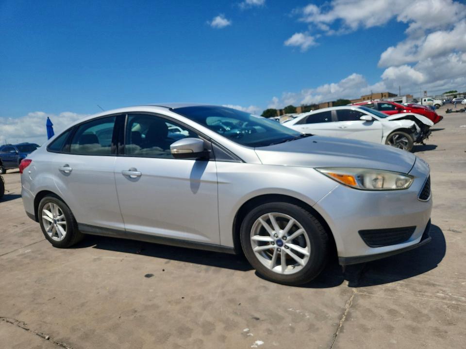 Photo 4 from auction – 2016 FORD FOCUS with VIN 1FADP3F23GL376276