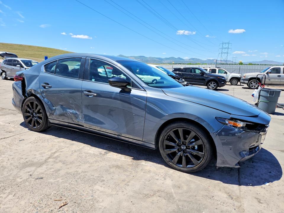 Photo 4 from auction – 2022 MAZDA 3 with VIN 3MZBPACL2NM317747