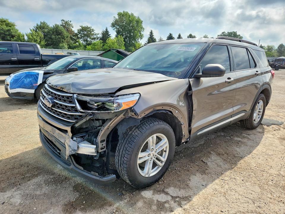 FORD EXPLORER 2021 with VIN 1FMSK8DH9MGA57842 - Photo from auction