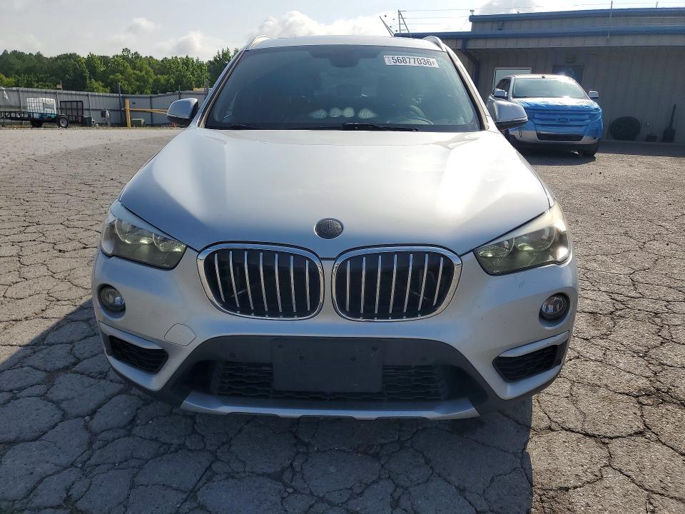 Photo 5 from auction – 2017 BMW X1 with VIN WBXHU7C30H5H34986