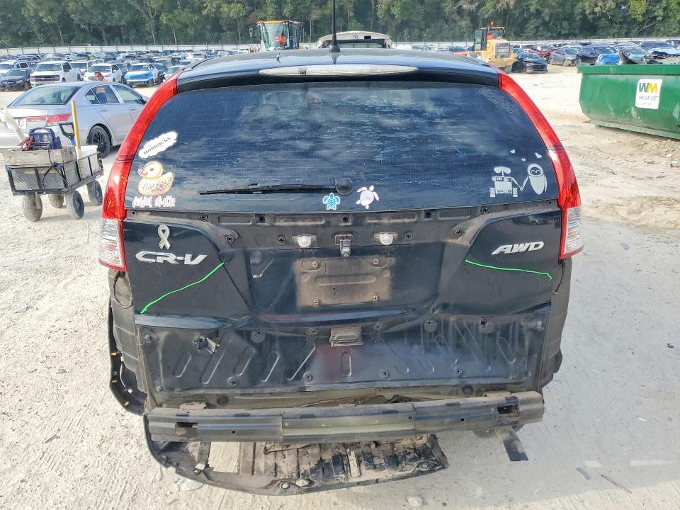 Photo 6 from auction – 2013 HONDA CR-V with VIN 2HKRM4H31DH647243