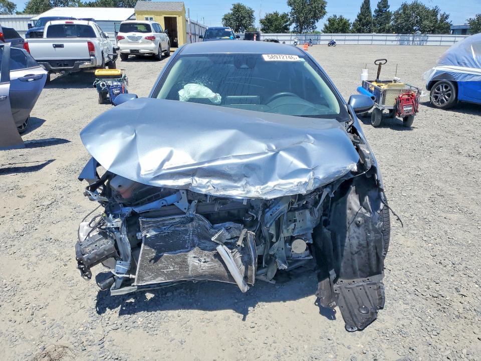 Photo 5 from auction – 2021 TOYOTA COROLLA with VIN 5YFEPMAE6MP212884