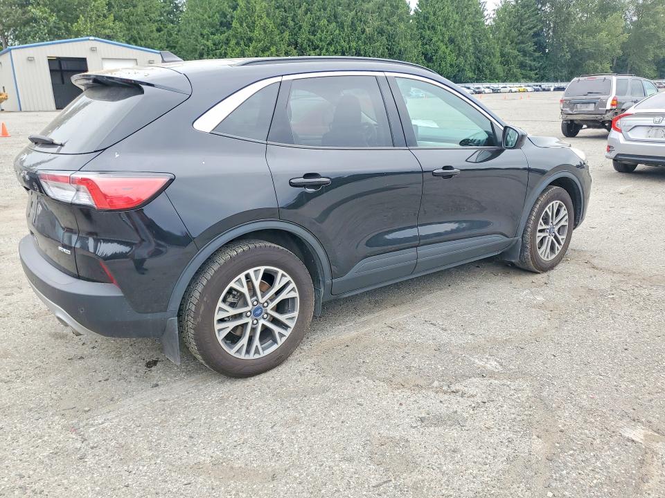 Photo 3 from auction – 2021 FORD ESCAPE with VIN 1FMCU9H68MUA87686