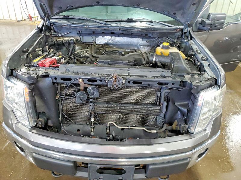 Photo 11 from auction – 2014 FORD F150 with VIN 1FTFW1EF4EFC28129