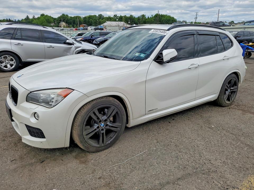 BMW X1 2015 with VIN WBAVM5C53FVV94431 - Photo from auction