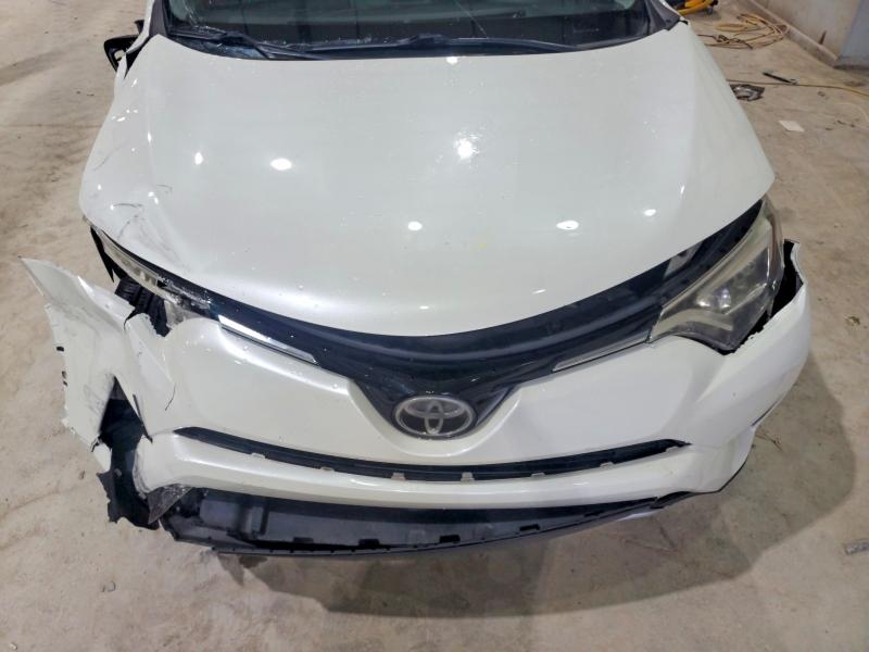 Photo 12 from auction – 2018 TOYOTA RAV4 with VIN JTMDFREV2JJ231406
