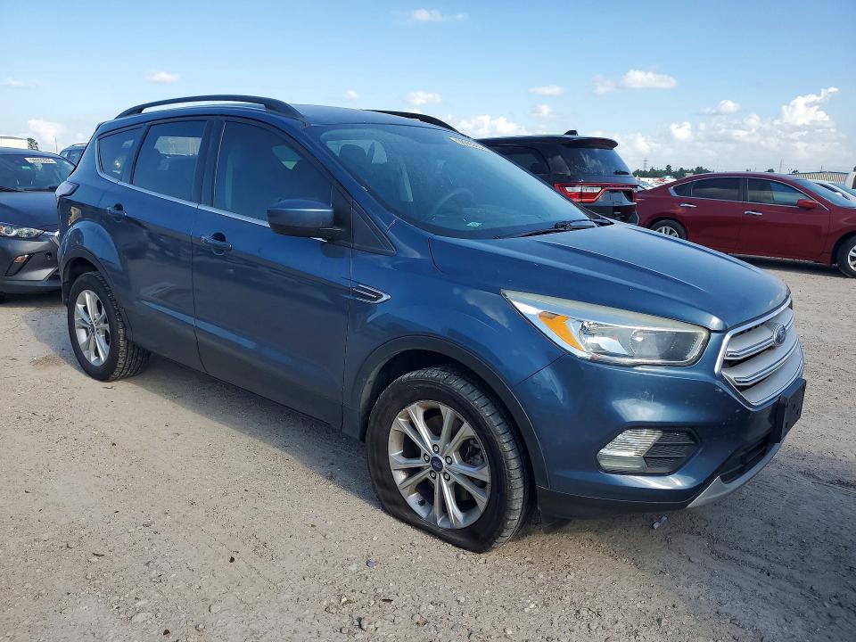 Photo 4 from auction – 2018 FORD ESCAPE with VIN 1FMCU9GD6JUA99296