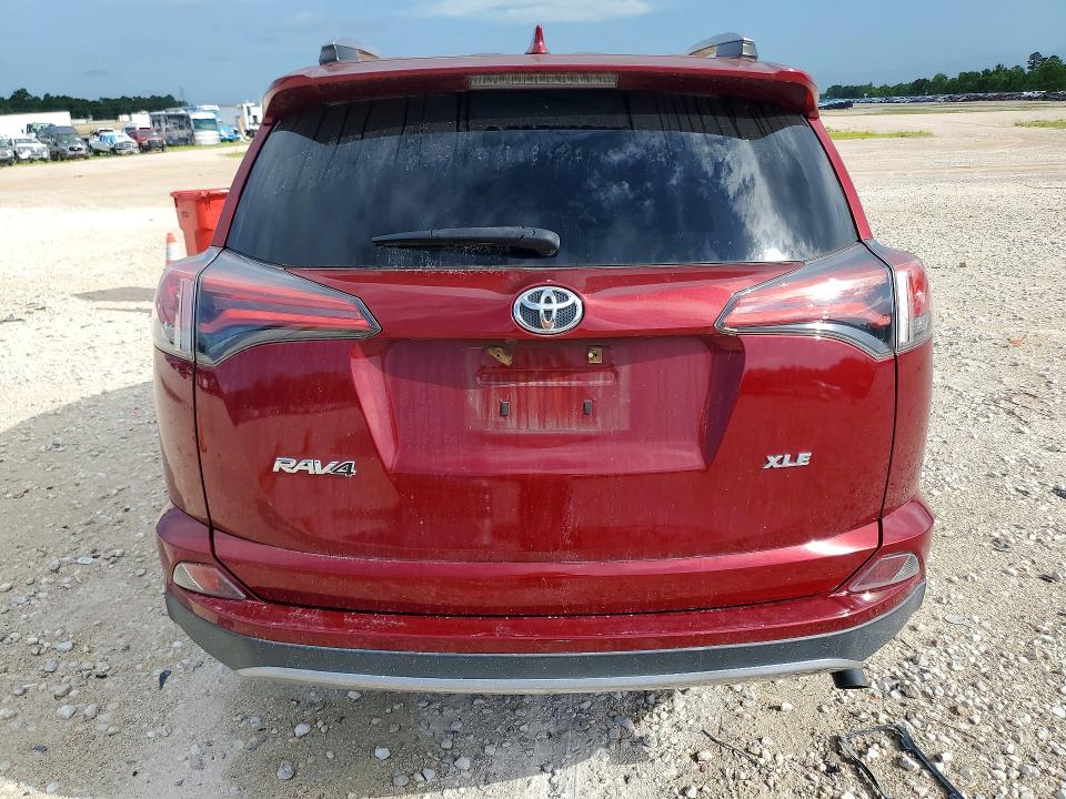 Photo 6 from auction – 2018 TOYOTA RAV4 with VIN 2T3WFREV0JW433526