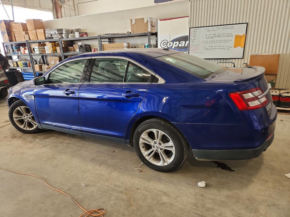Photo 2 from auction – 2014 FORD TAURUS with VIN 1FAHP2H80EG104299