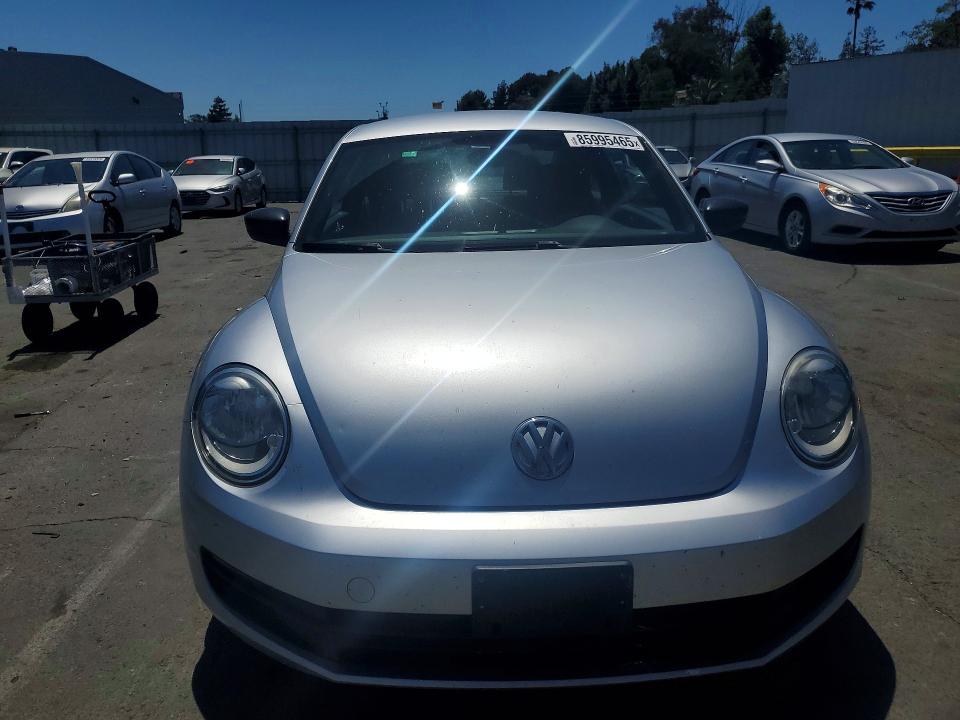 Photo 5 from auction – 2013 VOLKSWAGEN BEETLE with VIN 3VWFP7ATXDM646878