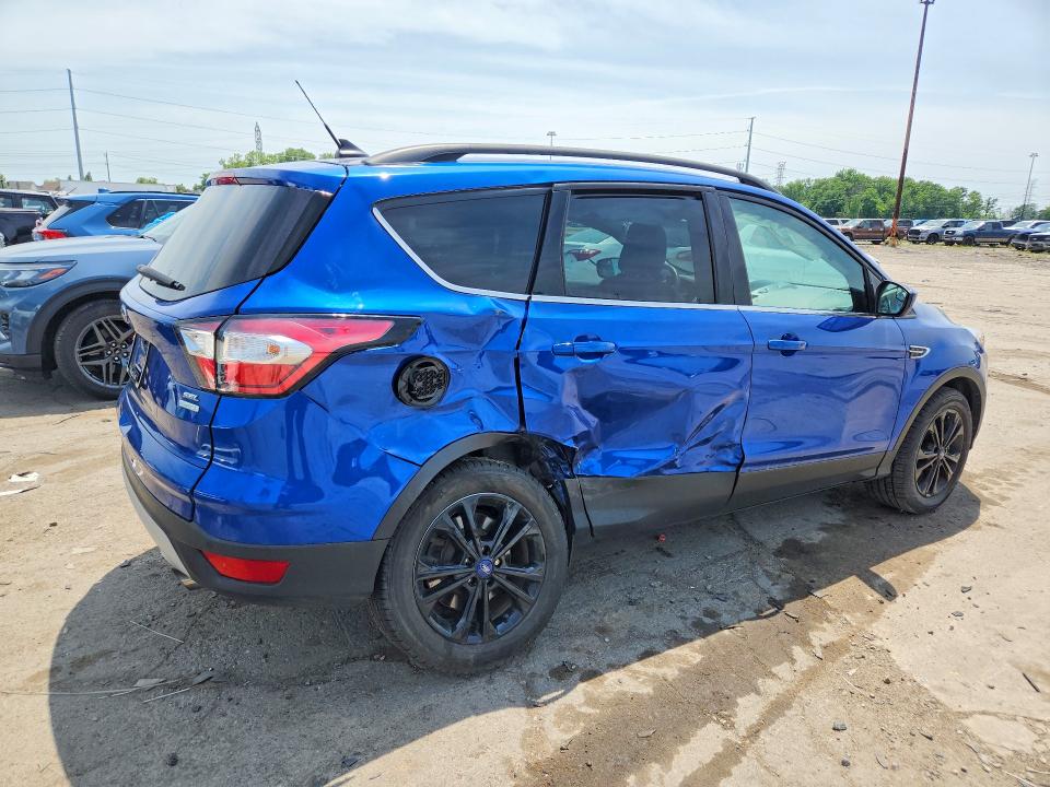 Photo 3 from auction – 2018 FORD ESCAPE with VIN 1FMCU0HD9JUC46852