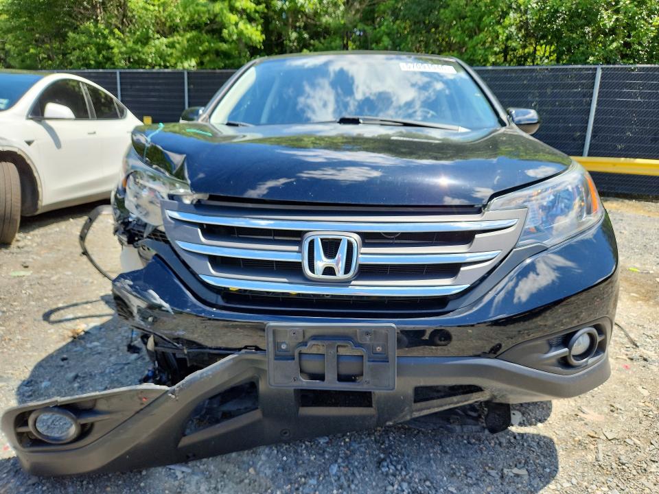 Photo 5 from auction – 2014 HONDA CR-V with VIN 2HKRM4H56EH656152