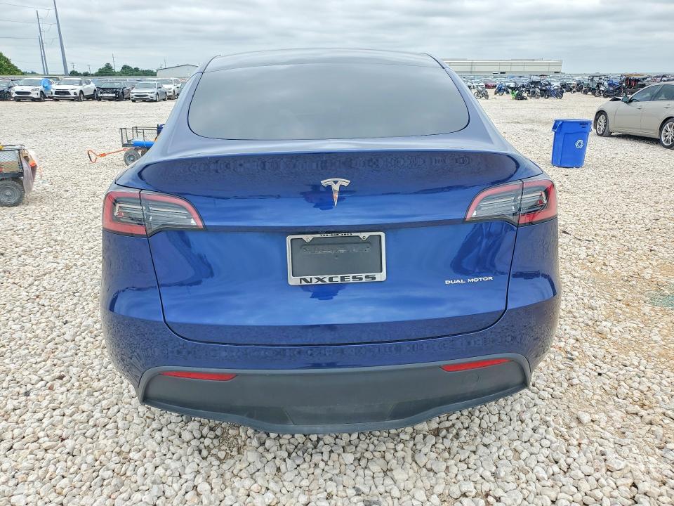 Photo 6 from auction – 2023 TESLA MODEL Y with VIN 7SAYGAEEXPF647190