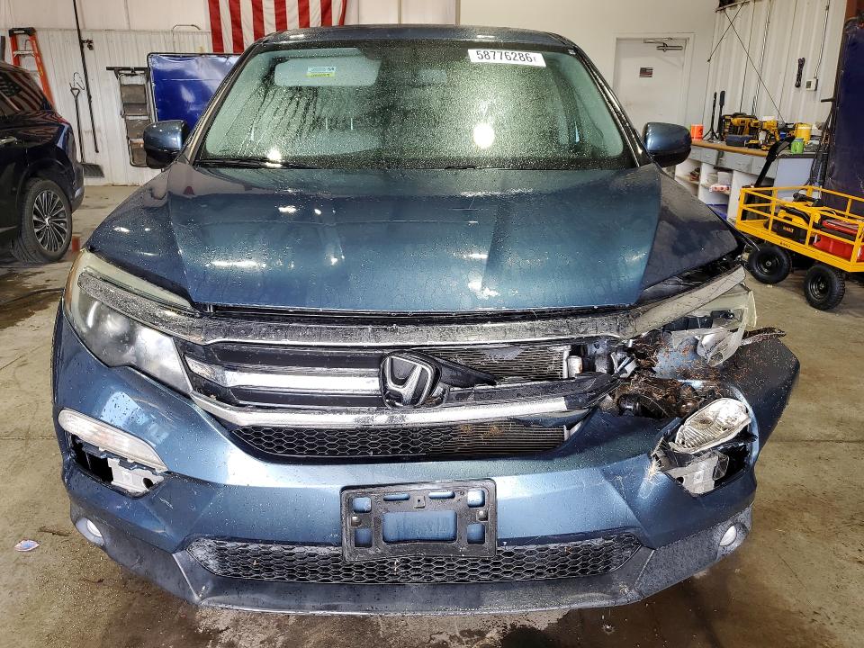 Фото 5 с аукциона – 2016 HONDA PILOT с VIN 5FNYF5H59GB008432
