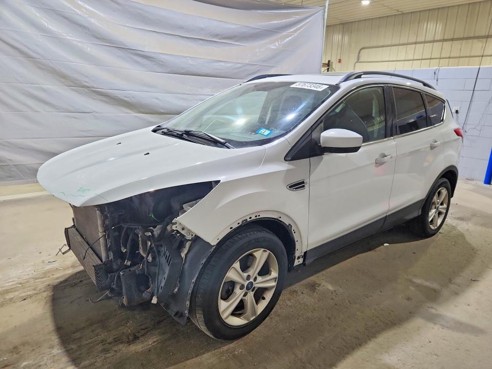 FORD ESCAPE 2015 with VIN 1FMCU9GX4FUB99785 - Photo from auction