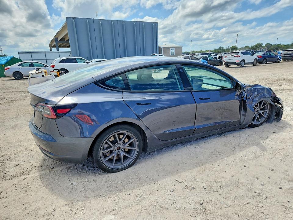 Photo 3 from auction – 2023 TESLA MODEL 3 with VIN 5YJ3E1EA7PF697474
