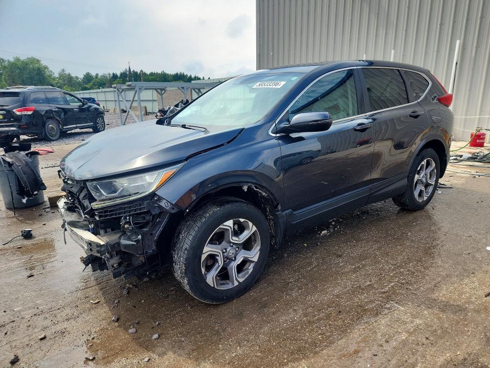 HONDA CR-V 2017 with VIN 5J6RW2H5XHL058719 - Photo from auction