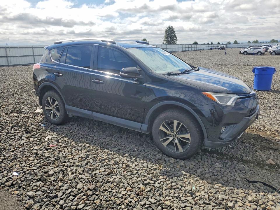 Photo 4 from auction – 2016 TOYOTA RAV4 with VIN 2T3RFREV8GW410971