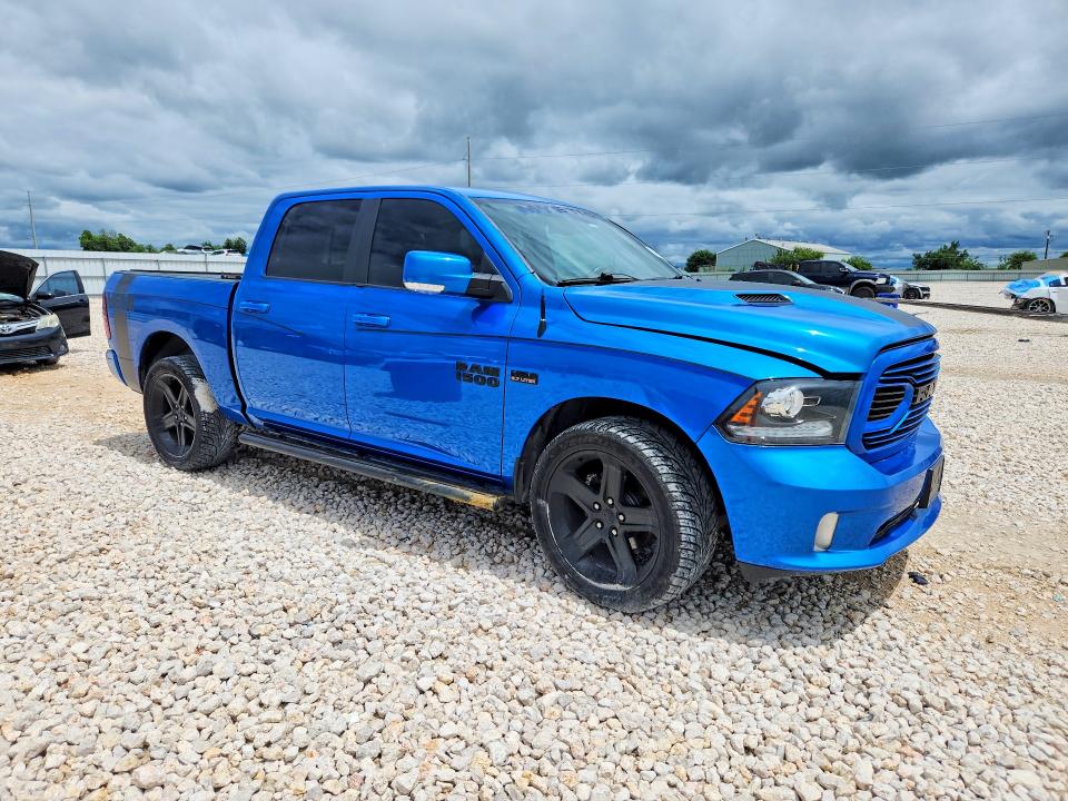 Photo 4 from auction – 2018 RAM 1500 with VIN 1C6RR6MT8JS195668