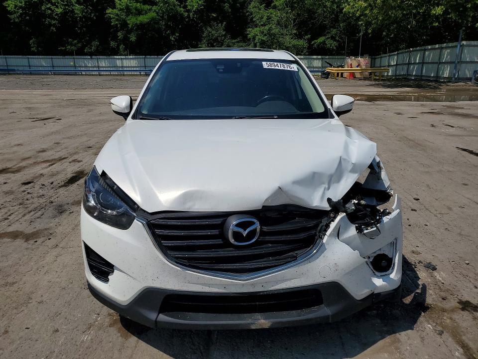 Photo 5 from auction – 2016 MAZDA CX-5 with VIN JM3KE4DY3G0852247