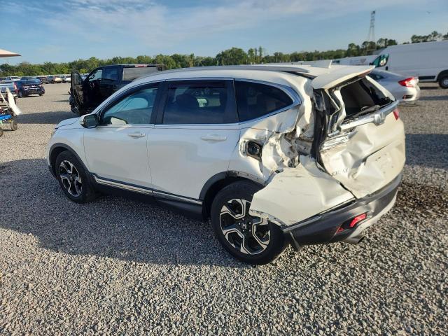 Photo 2 from auction – 2017 HONDA CR-V with VIN 5J6RW1H99HL016412