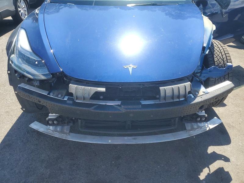 Photo 11 from auction – 2023 TESLA MODEL 3 with VIN 5YJ3E1EA3PF579695