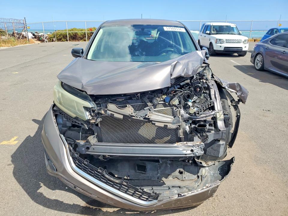 Photo 5 from auction – 2015 HONDA CR-V with VIN 3CZRM3H34FG714952