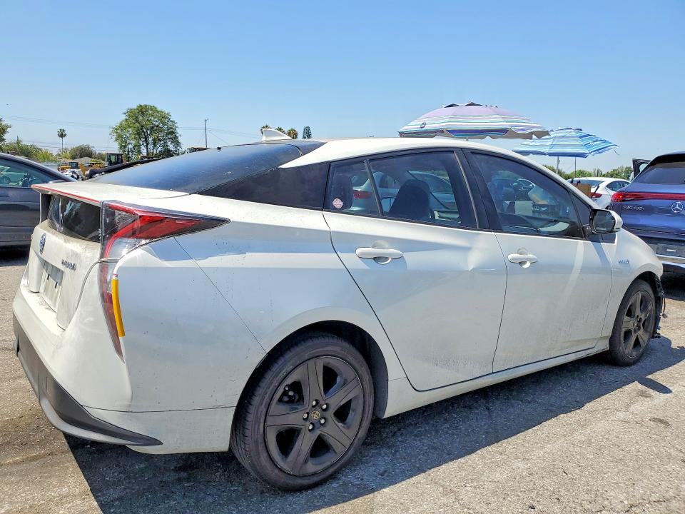 Photo 3 from auction – 2016 TOYOTA PRIUS with VIN JTDKARFU5G3019088