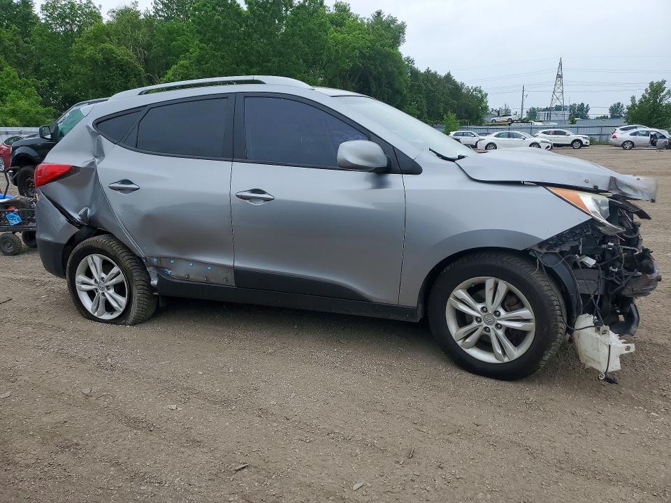 Photo 4 from auction – 2012 HYUNDAI TUCSON with VIN KM8JUCAC5CU459701