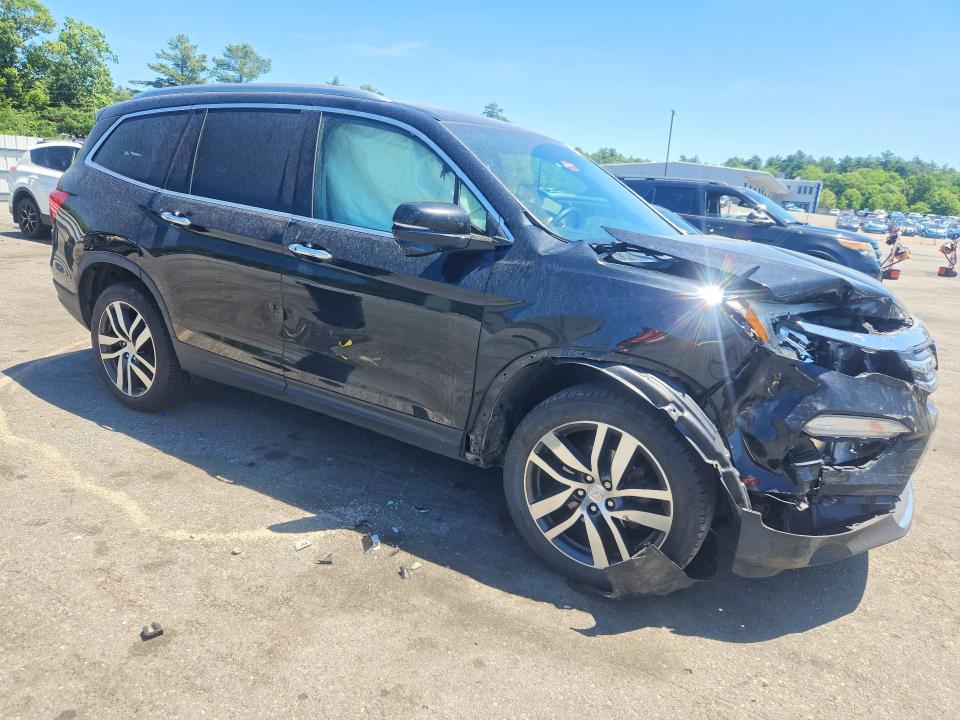 Photo 4 from auction – 2016 HONDA PILOT with VIN 5FNYF6H93GB068344