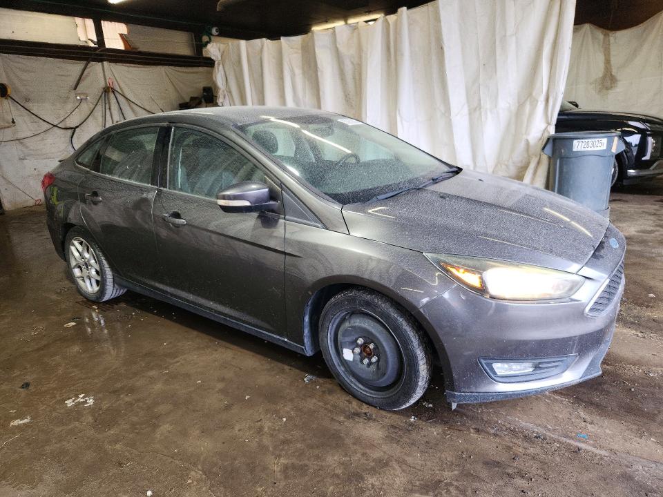 Photo 4 from auction – 2015 FORD FOCUS with VIN 1FADP3F22FL252143