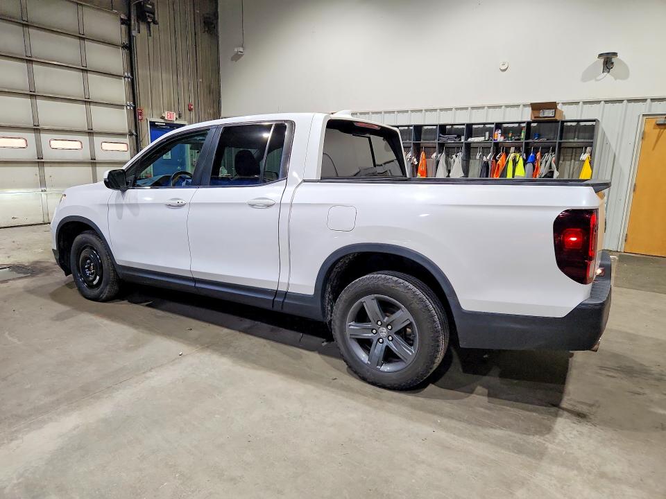 Photo 2 from auction – 2023 HONDA RIDGELINE with VIN 5FPYK3F50PB027378