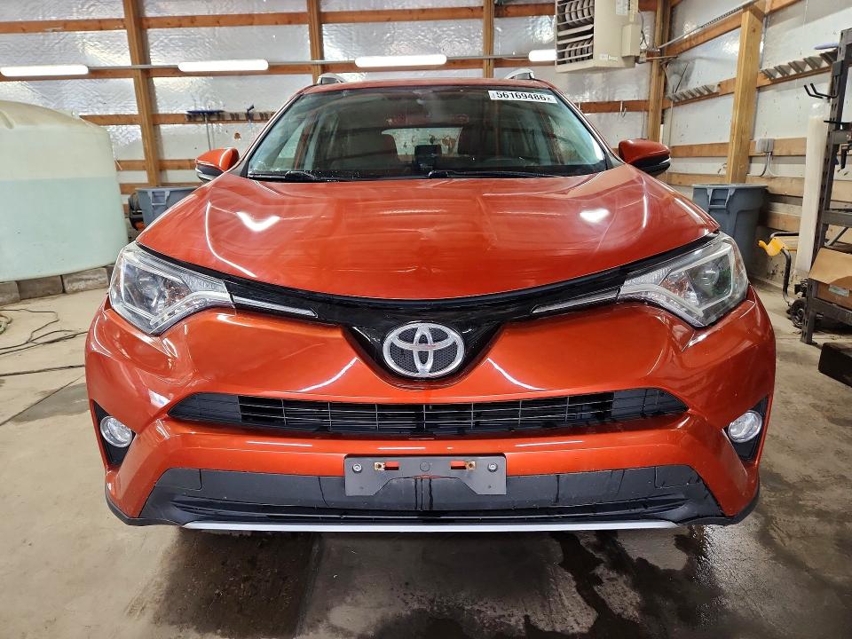 Photo 5 from auction – 2016 TOYOTA RAV4 with VIN 2T3RFREV7GW478355