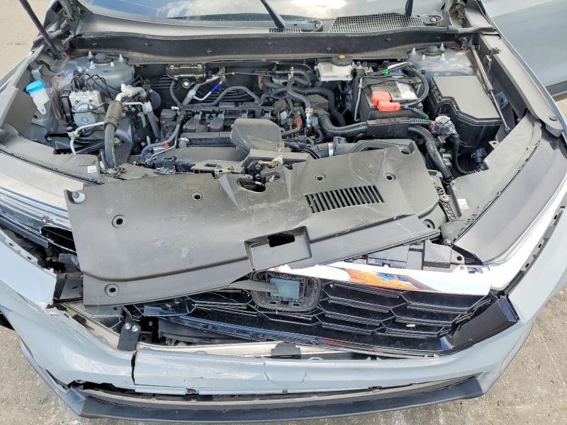 Photo 11 from auction – 2023 HONDA CR-V with VIN 2HKRS3H75PH306760