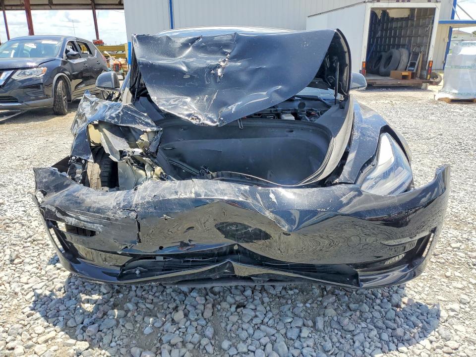 Photo 5 from auction – 2022 TESLA MODEL 3 with VIN 5YJ3E1EC5NF123535